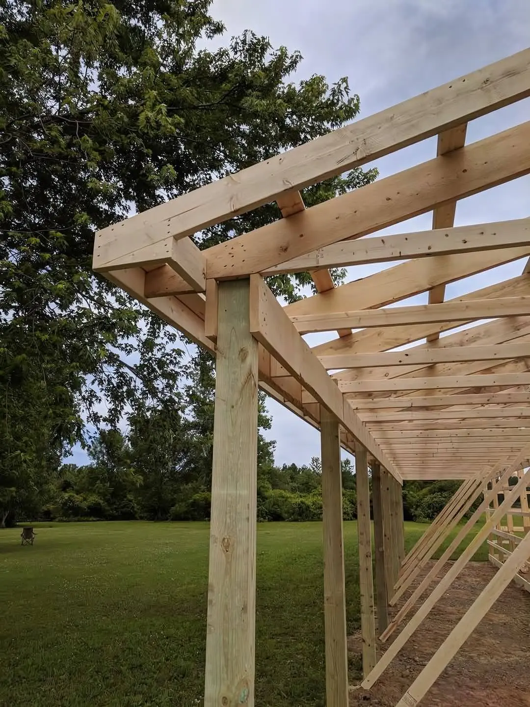 Open pergola frame with timber posts