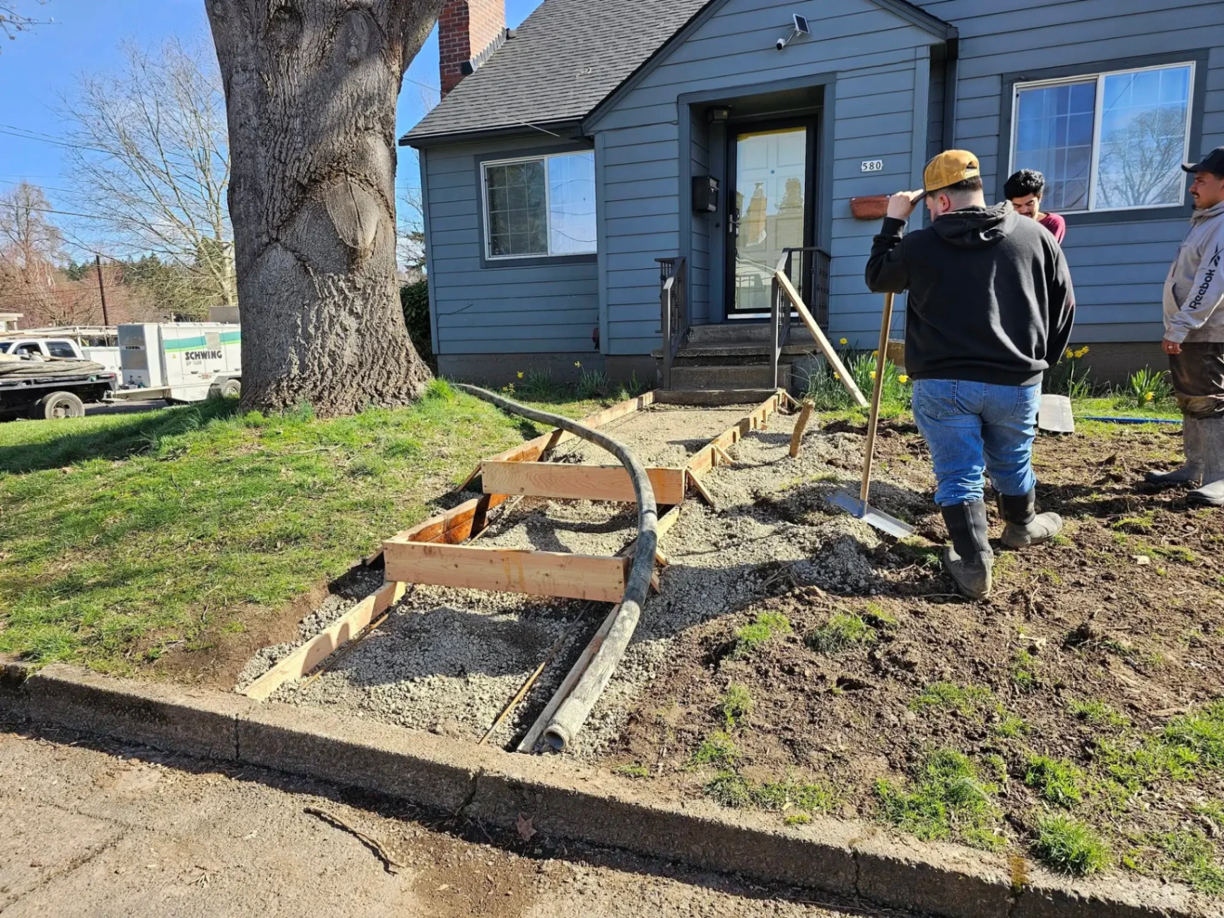 Walkway form setup and concrete pour prep