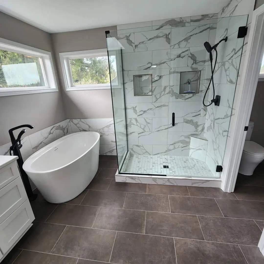 Master bathroom with freestanding tub and glass shower