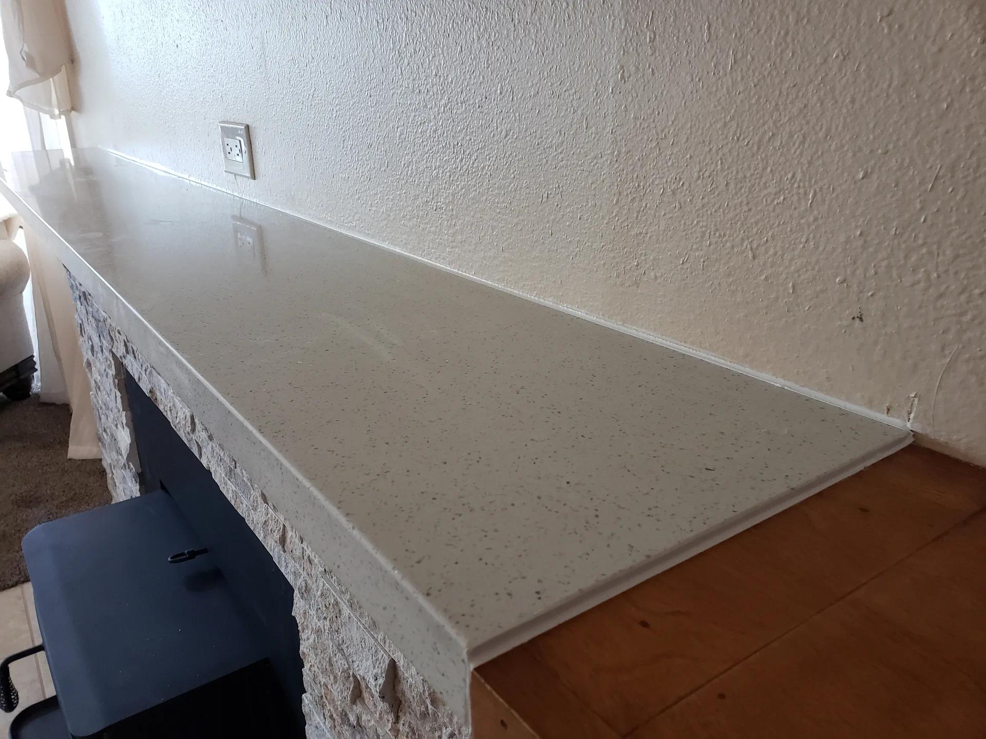 Stone fireplace mantle installation