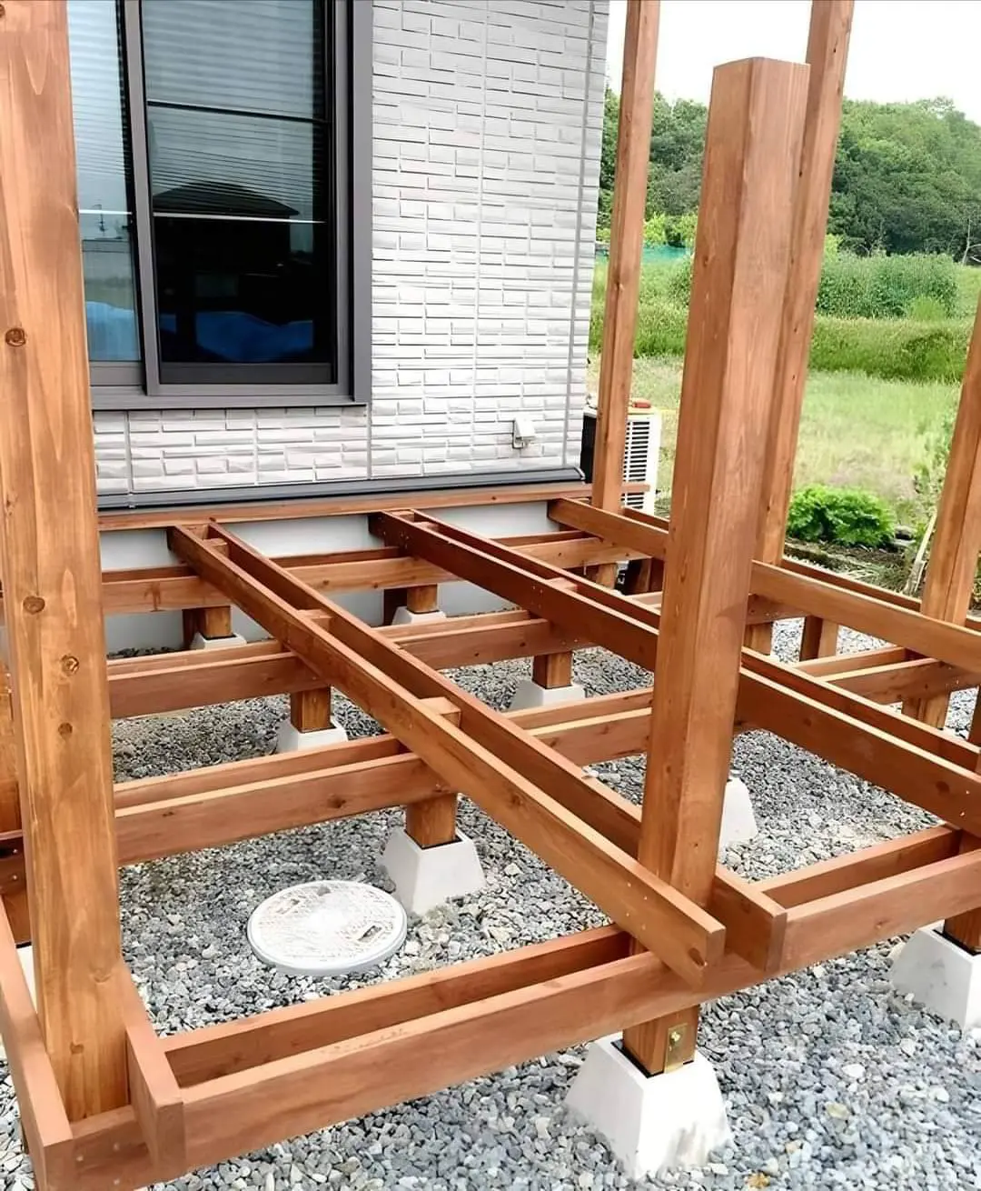 Deck and pergola post framing on concrete piers