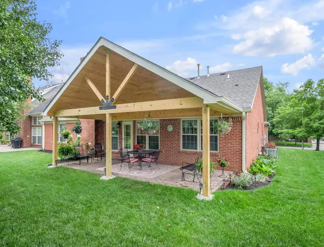 Gable-roof patio cover with timber posts