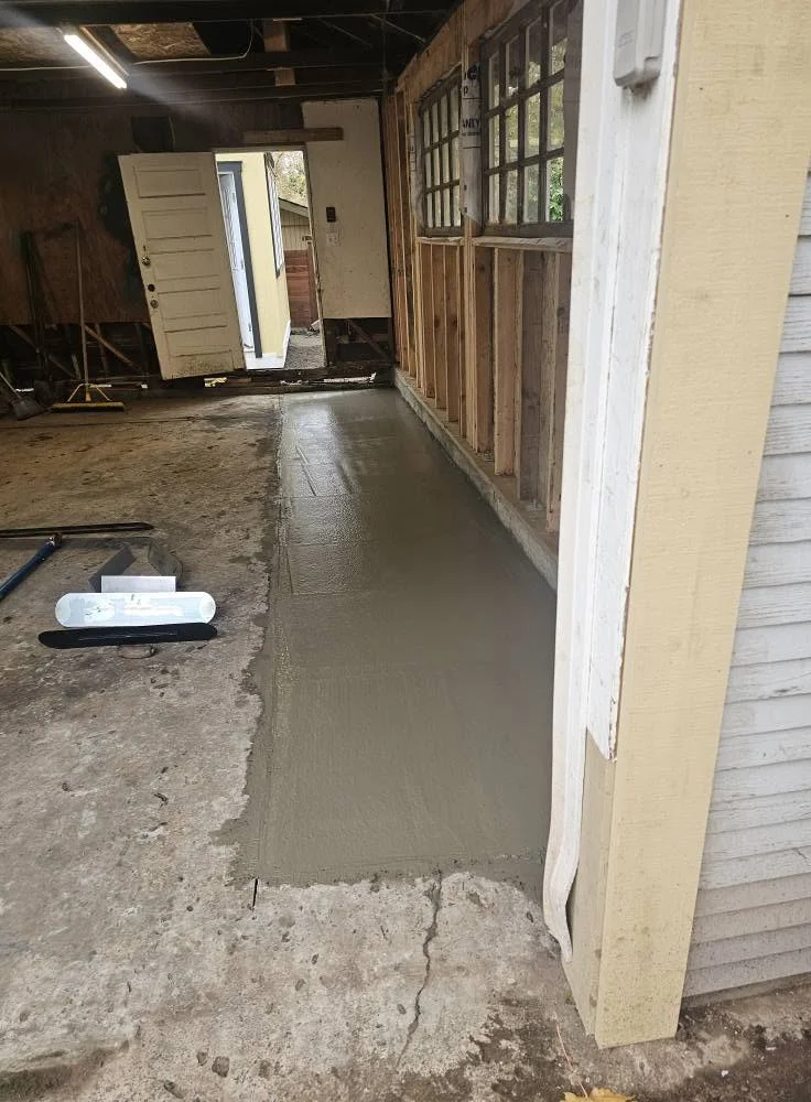 Concrete slab pour inside garage interior